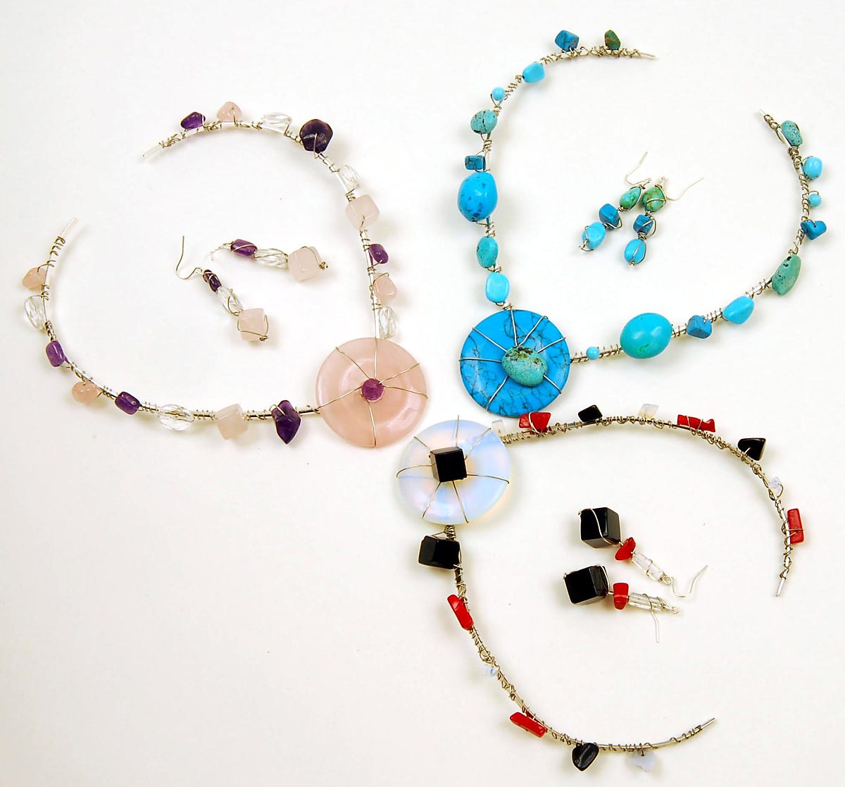 Three wire-wrapped collar sets with rose quartz, turquoise and opalite discs